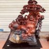 Tượng Phật Di Lặc Đứng Gốc Cây Tùng