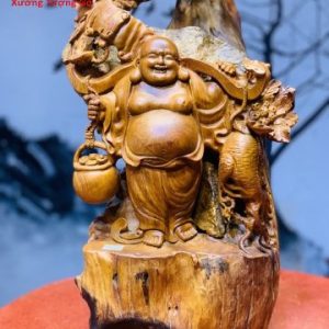 Di Lặc Gánh Gậy Đứng cây Đào