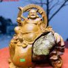 Di Lặc Ôm Đá Hương Ta