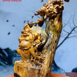 Di Lặc Gánh Gậy Đứng cây Đào