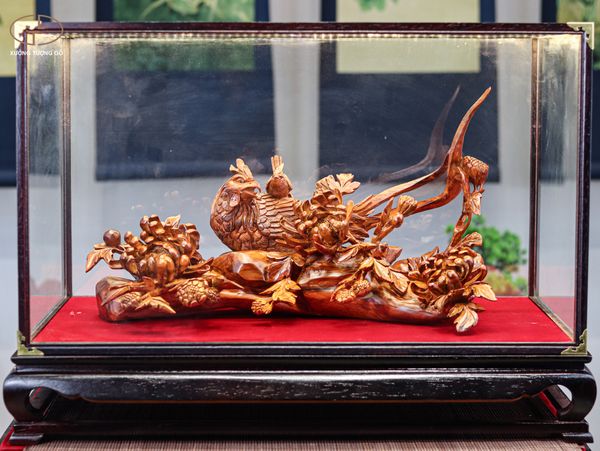 Chim trĩ hoa phù dung gỗ sưa
