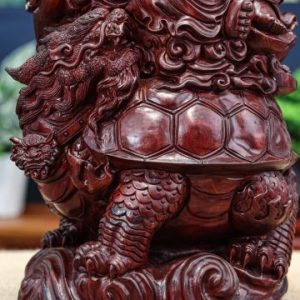 Di lặc cưỡi long quy tử đàn