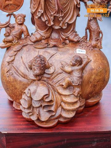 Di Lạc Vác Cành Đào Ngũ Tiểu Đứng Bao Tiền Gỗ Nu Hương