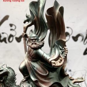 Đạt ma hàm long gỗ trắc.