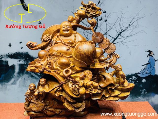 Di lặc ngũ tiểu vác gậy như ý. Di lặc ngũ tiểu vác gậy như ý.