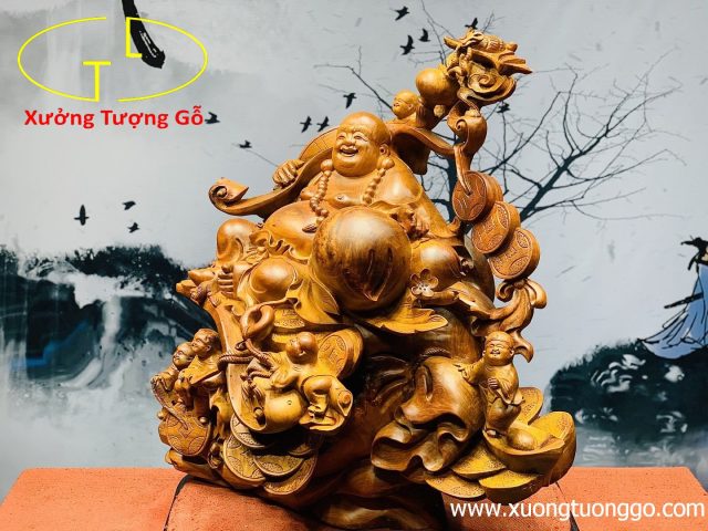 Di lặc ngũ tiểu vác gậy như ý. Di lặc ngũ tiểu vác gậy như ý.