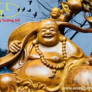 Di lặc ngũ tiểu vác gậy như ý. Di lặc ngũ tiểu vác gậy như ý.