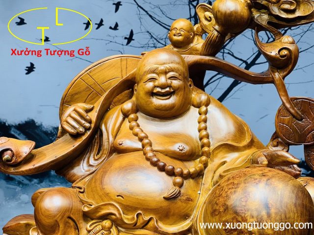 Di lặc ngũ tiểu vác gậy như ý. Di lặc ngũ tiểu vác gậy như ý.