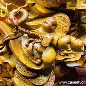 Di lặc ngũ tiểu vác gậy như ý. Di lặc ngũ tiểu vác gậy như ý.