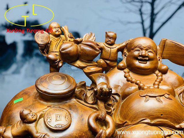 Di lặc ngũ phúc ngồi chum gỗ hương. Di lặc ngũ phúc ngồi chum gỗ hương.
