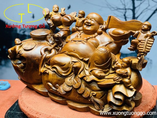 Di lặc ngũ phúc ngồi chum gỗ hương. Di lặc ngũ phúc ngồi chum gỗ hương.
