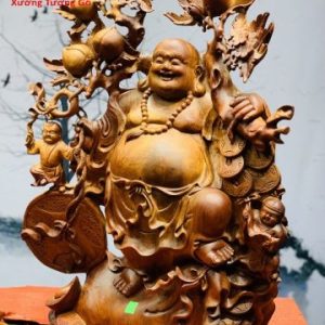 Di lặc nhị tiểu vác đào đứng bao tiền gỗ hương ta.
