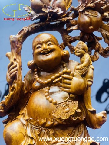 Di Lặc ngũ phúc vác cành đào gỗ hương ta. Di Lặc ngũ phúc vác cành đào gỗ hương ta.