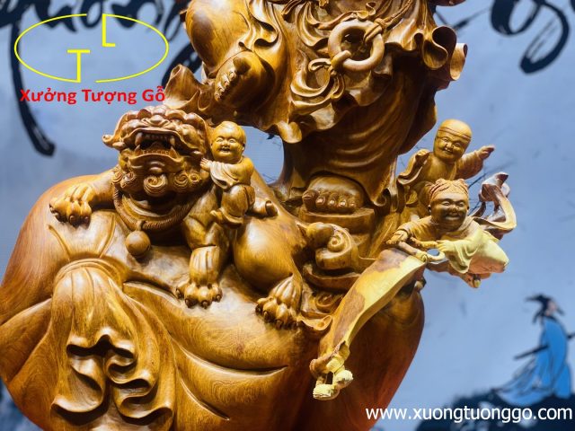 Di Lặc ngũ phúc vác cành đào gỗ hương ta. Di Lặc ngũ phúc vác cành đào gỗ hương ta.