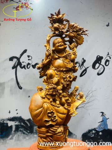 Di Lặc ngũ phúc vác cành đào gỗ hương ta. Di Lặc ngũ phúc vác cành đào gỗ hương ta.