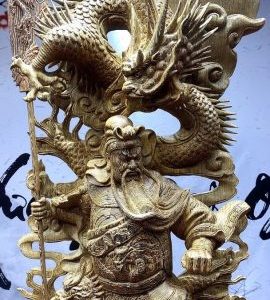 Quan công cầm đao gỗ mun đuôi công.