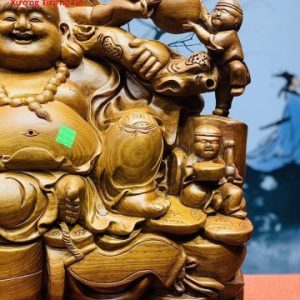 Di Lặc ngũ tiểu vác đào ngồi tiền hương ta.