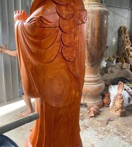 Di Lặc chúc phúc gỗ hương.
