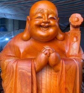 Di Lặc chúc phúc gỗ hương.