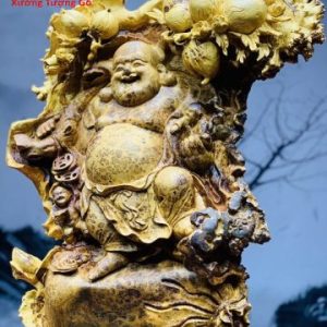 Di Lặc nhị tiểu vác đào nu hương.