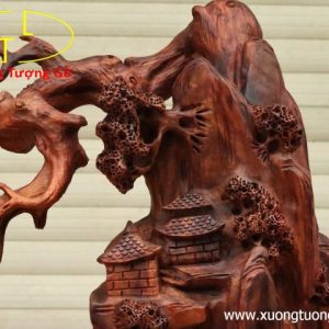 Nhất tâm bái Phật gỗ sưa