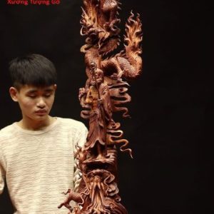 Đạt Ma ngự song long gỗ sưa đỏ