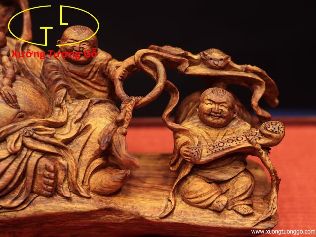 Di Lặc ngũ tiểu bao tiền gỗ sưa. Di Lặc ngũ tiểu bao tiền gỗ sưa.