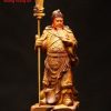Quan Công chống đao gỗ bách xanh.