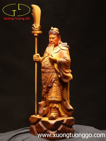 Quan Công chống đao gỗ bách xanh. Quan Công chống đao gỗ bách xanh.