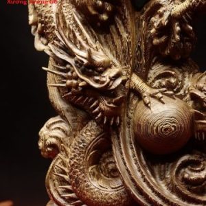 Quan công ngự Tam long gỗ mun đuôi công. Quan công ngự Tam long gỗ mun đuôi công.