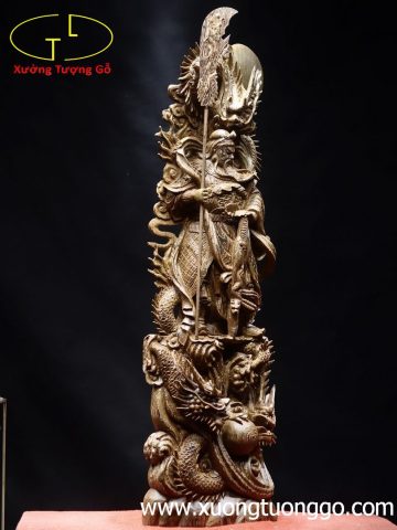 Quan công ngự Tam long gỗ mun đuôi công. Quan công ngự Tam long gỗ mun đuôi công.