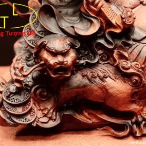 Di lặc nhất tiểu vác đào song nghê gỗ trắc