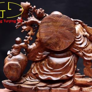 Di Lặc nhị tiểu vác đào gỗ cẩm.