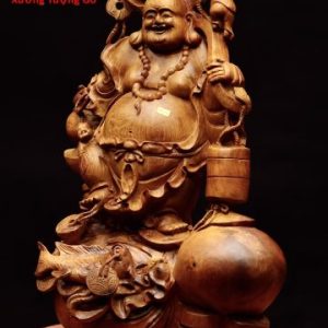 Di Lặc đứng bao tiền cá chép gỗ hương. Di Lặc đứng bao tiền cá chép gỗ hương.