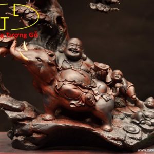 Di Lặc ngồi voi gỗ trắc.