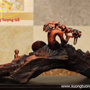 Nhất tâm bái Phật( tượng Phật gỗ) trắc