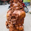 Di Lặc Cửu tiểu ngồi bao tiền nu hương.