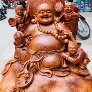 Di Lặc Cửu tiểu ngồi bao tiền nu hương.