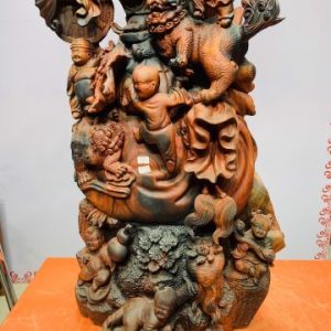 Di Lặc cửu tiểu vác đào đứng tùng gỗ trắc