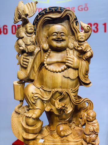 Di Lặc đứng trống tam tiểu gánh gậy như ý ngọc am. Di Lặc đứng trống tam tiểu gánh gậy như ý ngọc am.