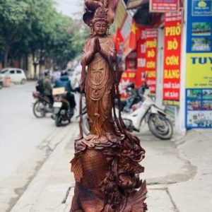 Quan Âm ngự cá chép hóa rồng gỗ cẩm.