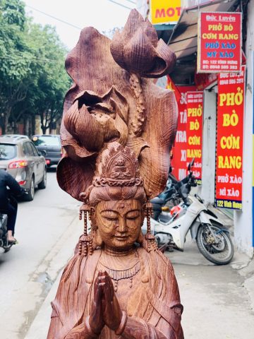 Quan Âm ngự cá chép hóa rồng gỗ cẩm. Quan Âm ngự cá chép hóa rồng gỗ cẩm.