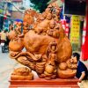 Di Lặc ngũ tiểu ngồi bao tiền nu hương
