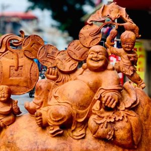Di Lặc ngũ tiểu ngồi bao tiền nu hương Di Lặc ngũ tiểu ngồi bao tiền nu hương