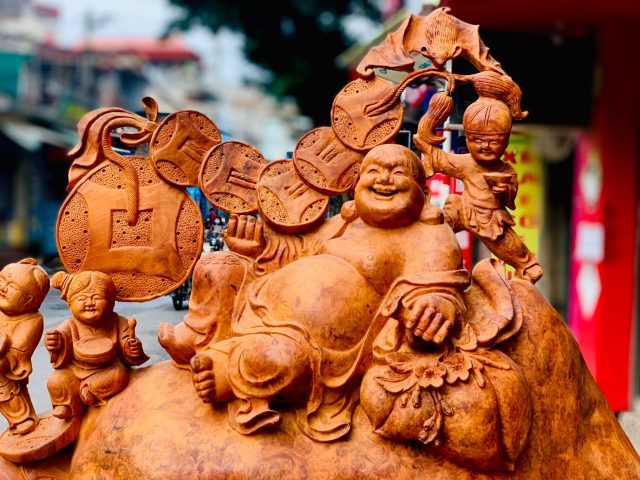 Di Lặc ngũ tiểu ngồi bao tiền nu hương Di Lặc ngũ tiểu ngồi bao tiền nu hương