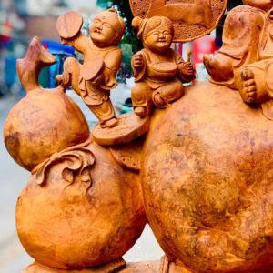 Di Lặc ngũ tiểu ngồi bao tiền nu hương Di Lặc ngũ tiểu ngồi bao tiền nu hương