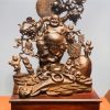 Di Lặc ngũ tiểu vác đào gỗ cẩm.