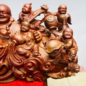 Di lặc chín tiểu ngồi tiền gỗ cẩm.