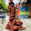 Đạt ma quá hải ngự long gỗ sưa đỏ.