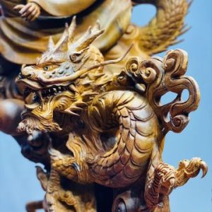 Đạt ma ngọa hổ tàng long gỗ hương.